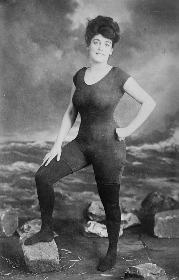 Annette Kellerman promotes women's right to wear a fitted one-piece bathing suit, 1907. She was arrested for indecency