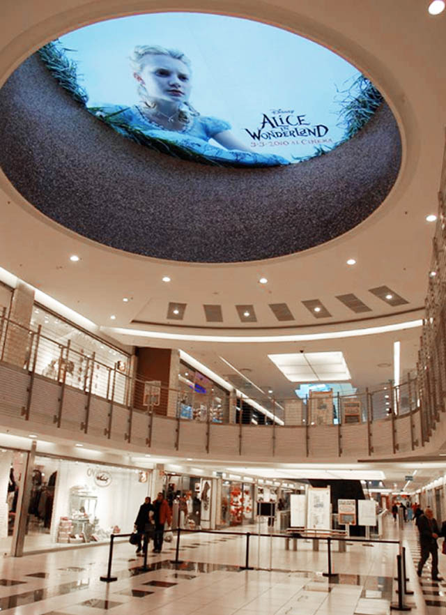 alice-in-wonderland-ceiling-ad-sticker-looking-down-into-mall