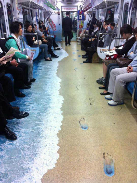 subway-floor-sticker-ad-looks-like-the-beach