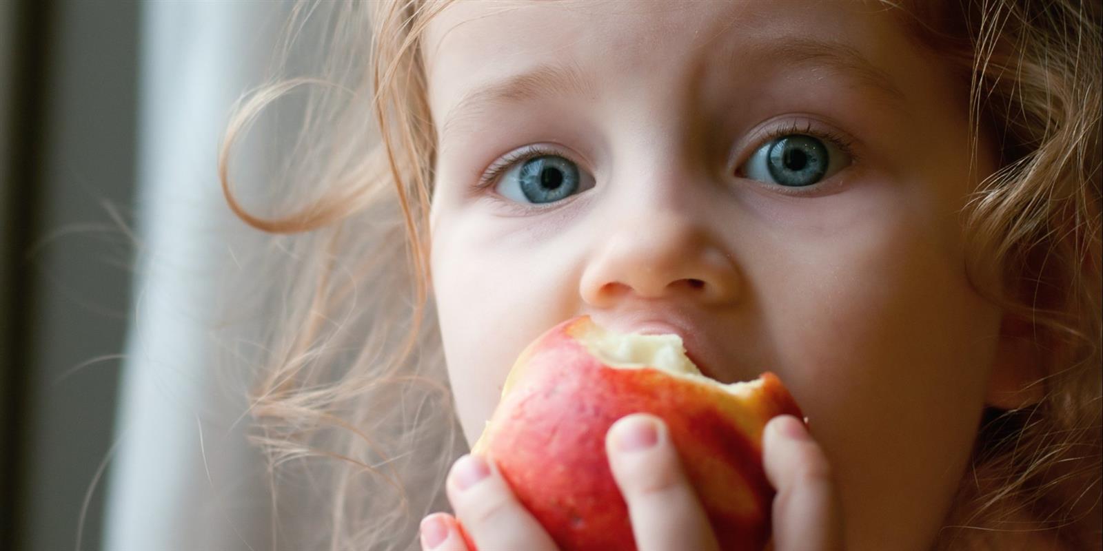 Child Eating Apple