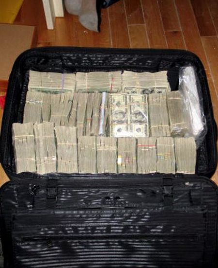 Mexican Drug Lord Home - 18 plastic bins filled with 100 dollar bills were found