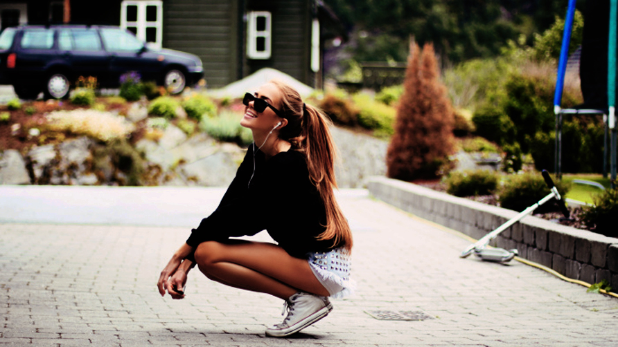 Young Woman Listening To Music