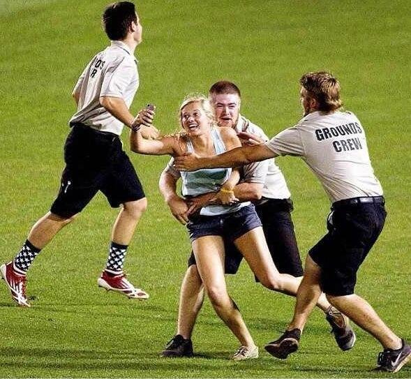 kayleigh-hill-ran-out-onto-a-baseball-field-during-the-2013-college-world-series-game-and-filmed-herself-being-tackled-by-security-guards-on-vine-all-for-the-sake-of-a-really-