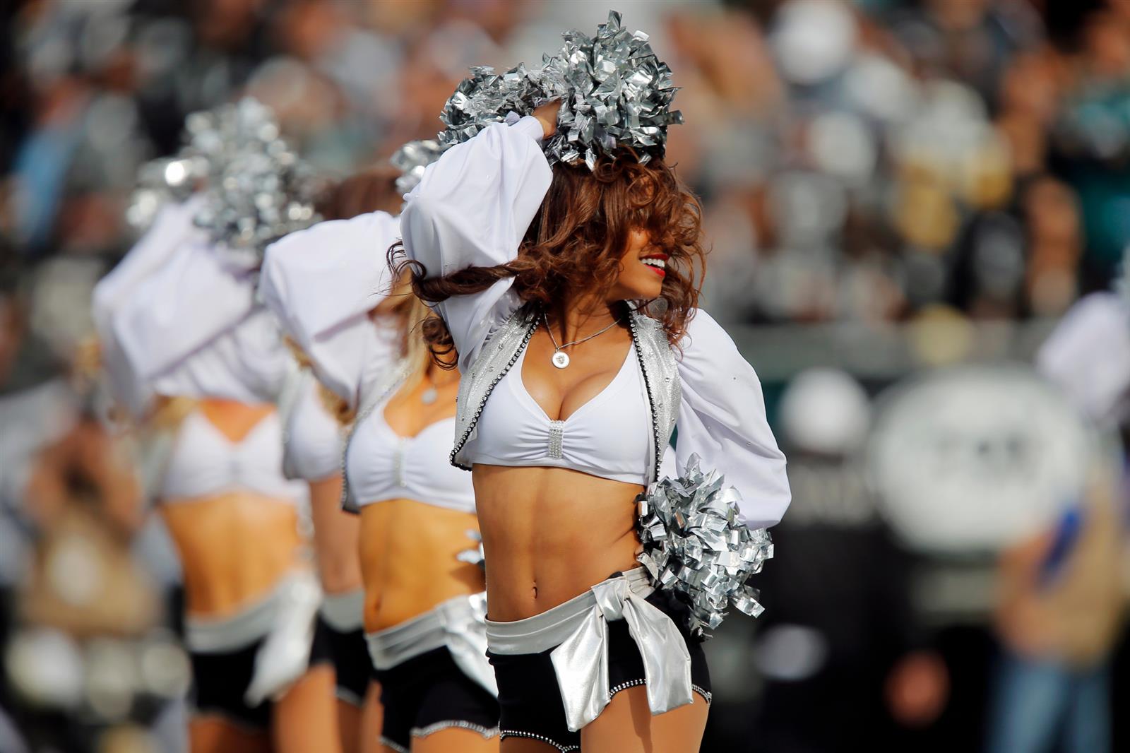 27 Photos Of The Beautiful NFL Cheerleading Squads - Oakland Raiderettes Vi...