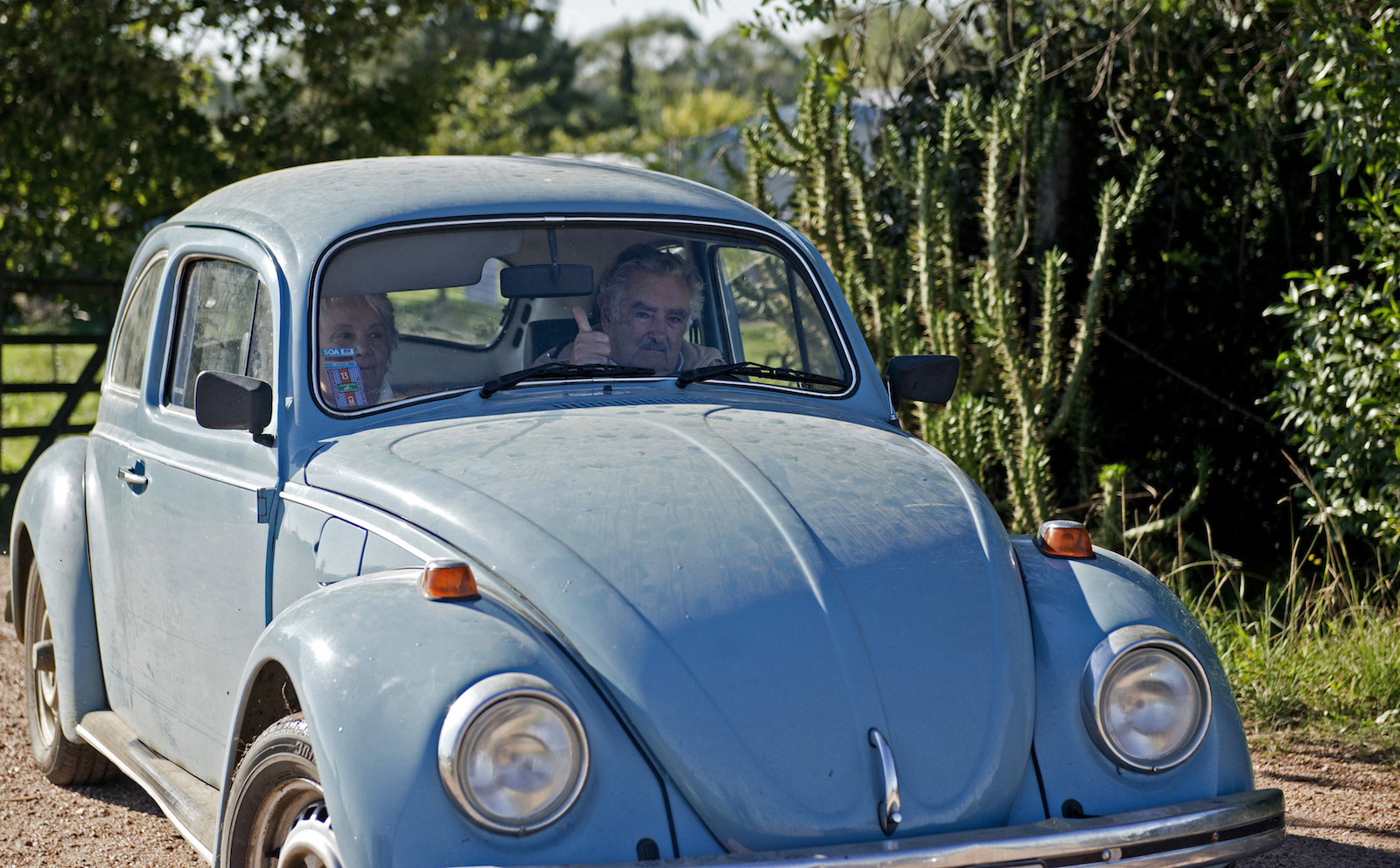 President of Uruguay, Jose Mujica with wife in his Volkswagen Beetle